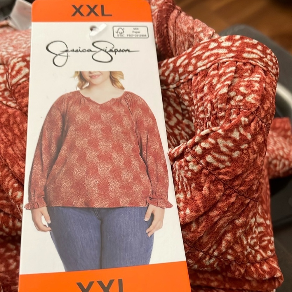 - Woman’s Jesssica Simpson blouse